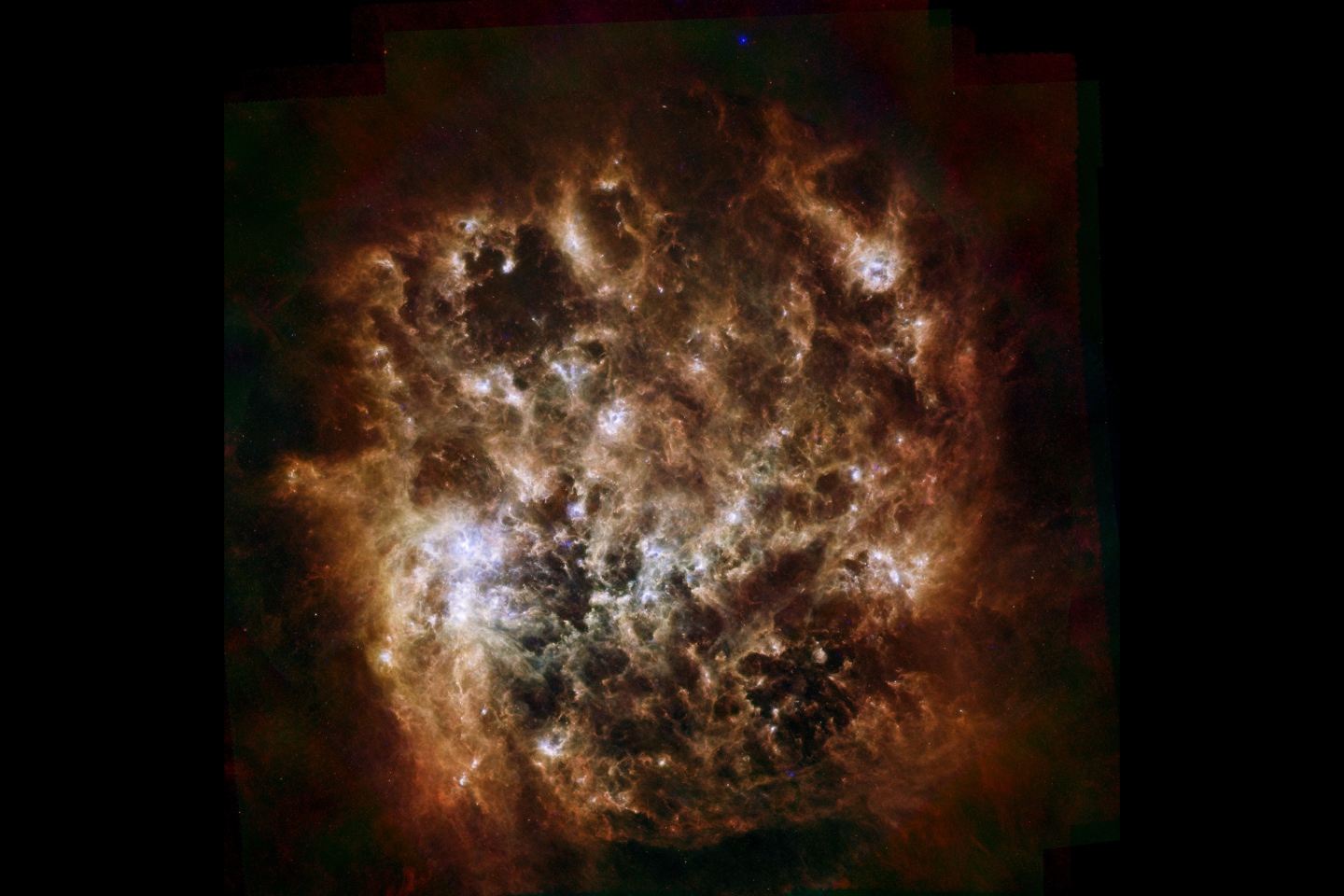 Карликовая галактика Большое Магелланово Облако, наблюдаемая в инфракрасном свете Гершельской космической обсерваторией. В таких регионах пространства, как этот, рождаются новые звезды из смеси элементов и космической пыли.
