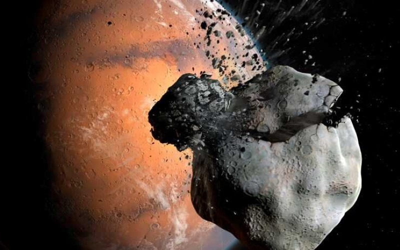 Представление художника о столкновении марсианской исконной луны с астероидом, которое могло привести к образованию Фобоса и Деймоса.